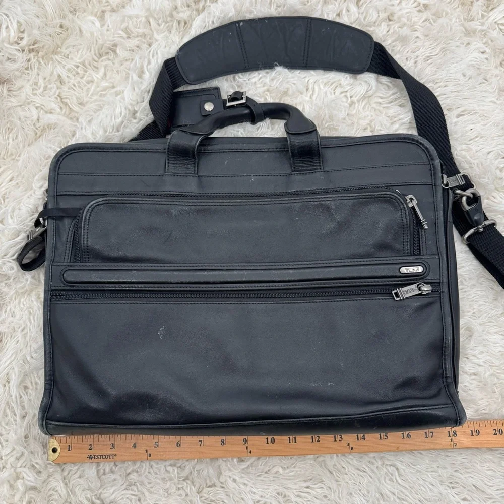 Tumi Black Leather Briefcase with Expandable Pouches Compartments